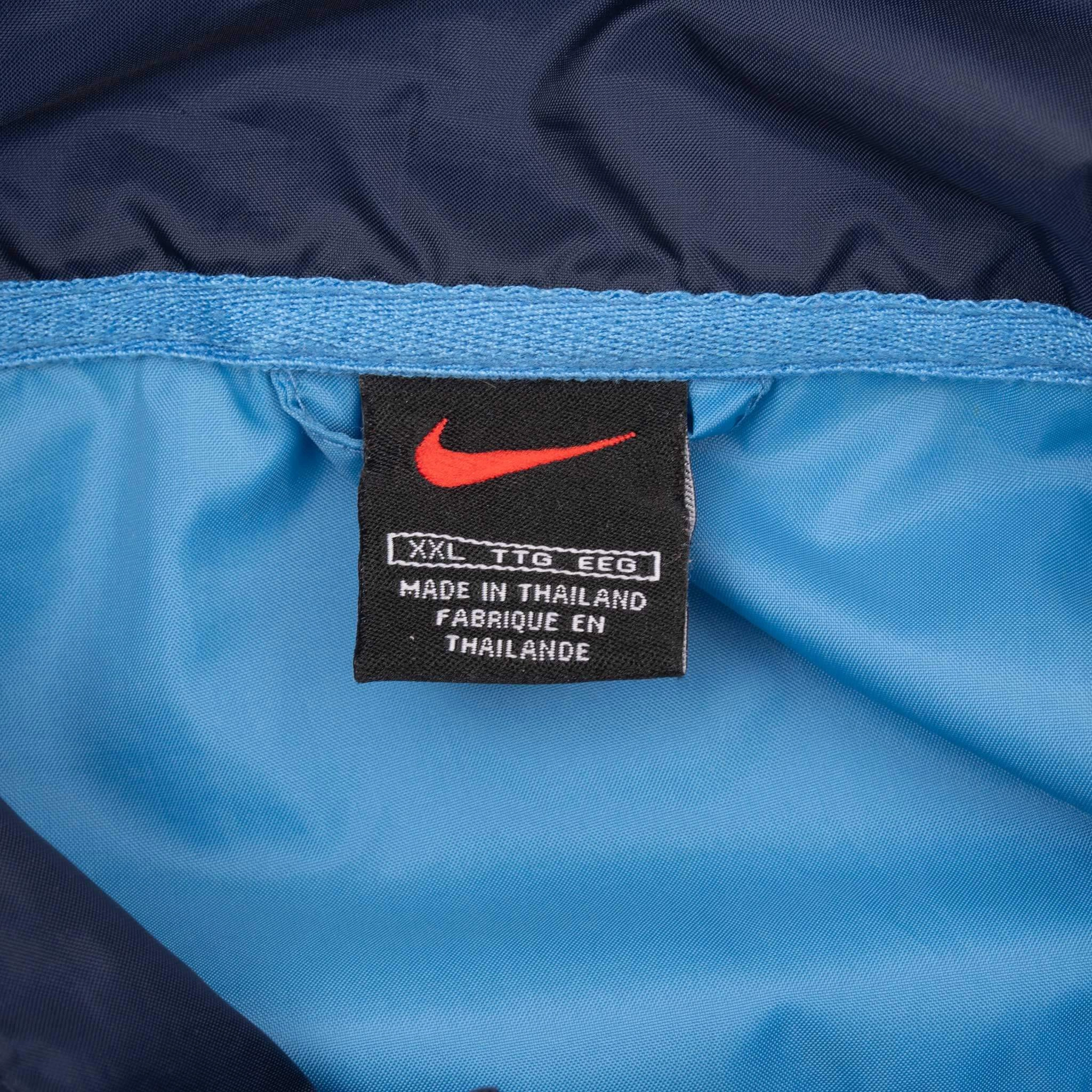 VINTAGE NIKE CLASSIC SWOOSH BLUE WINDBREAKER JACKET 1990S 2XL