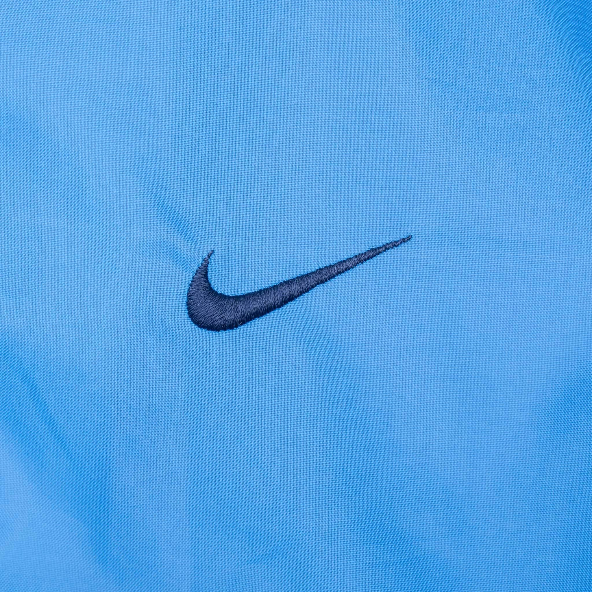 VINTAGE NIKE CLASSIC SWOOSH BLUE WINDBREAKER JACKET 1990S 2XL